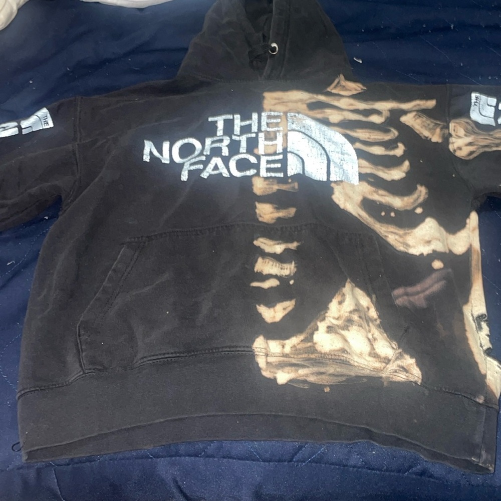North Face hoodie, extra small, with added skeleton print.
